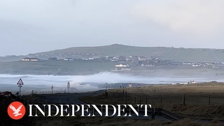 Waves crash over runway at Shetland's Sumburgh airport as 85mph winds batter UK