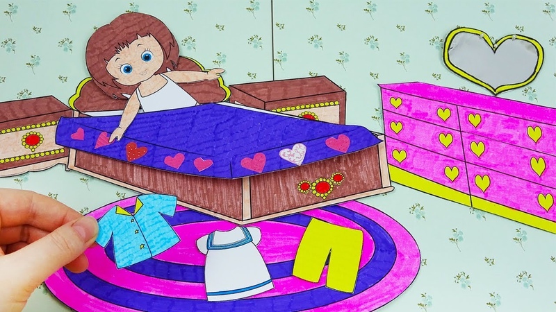 Paper Baby Doll Dressing up a new pajama in her cute heart