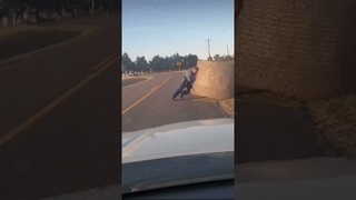 A State Highway Patrol trooper showed his strength on dashcam as he pushed a hay bale off the road.